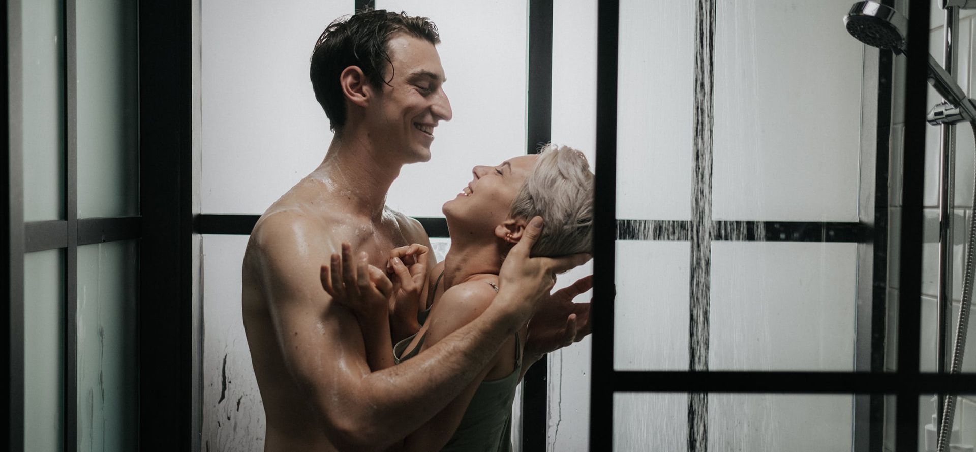 Taurus man with woman in shower.