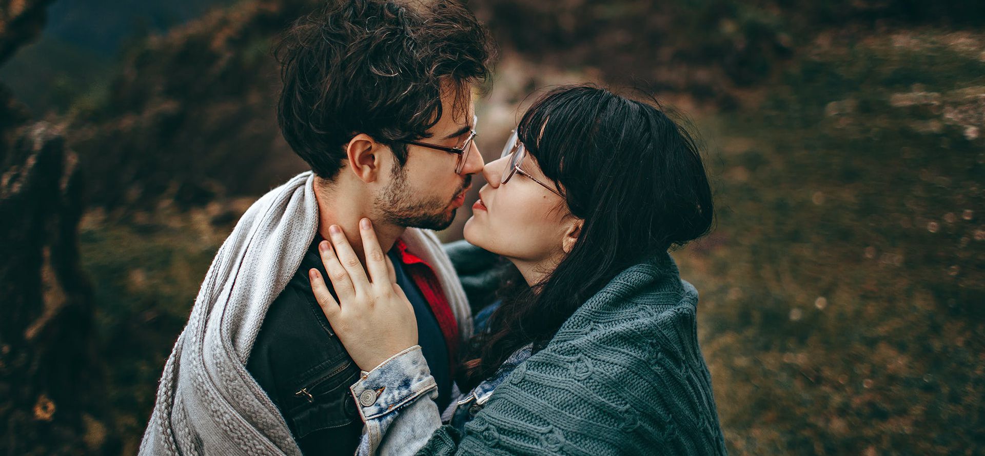 Capricorn man kisses woman on dating.