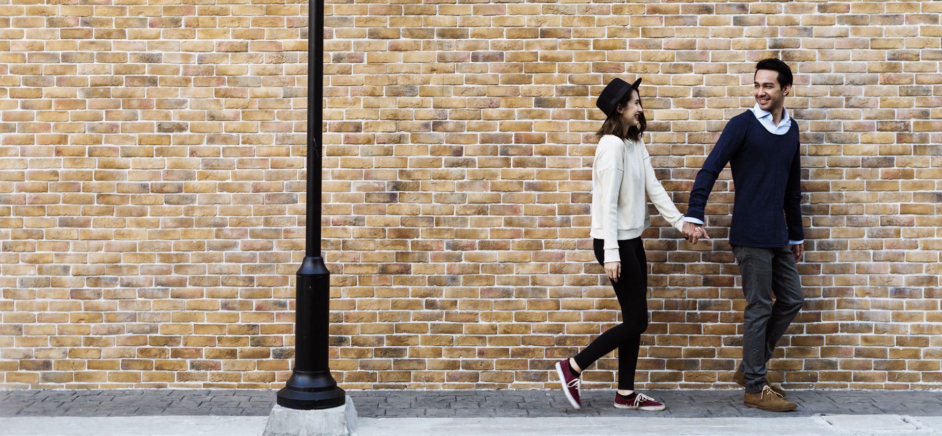 Libra man walking with woman.