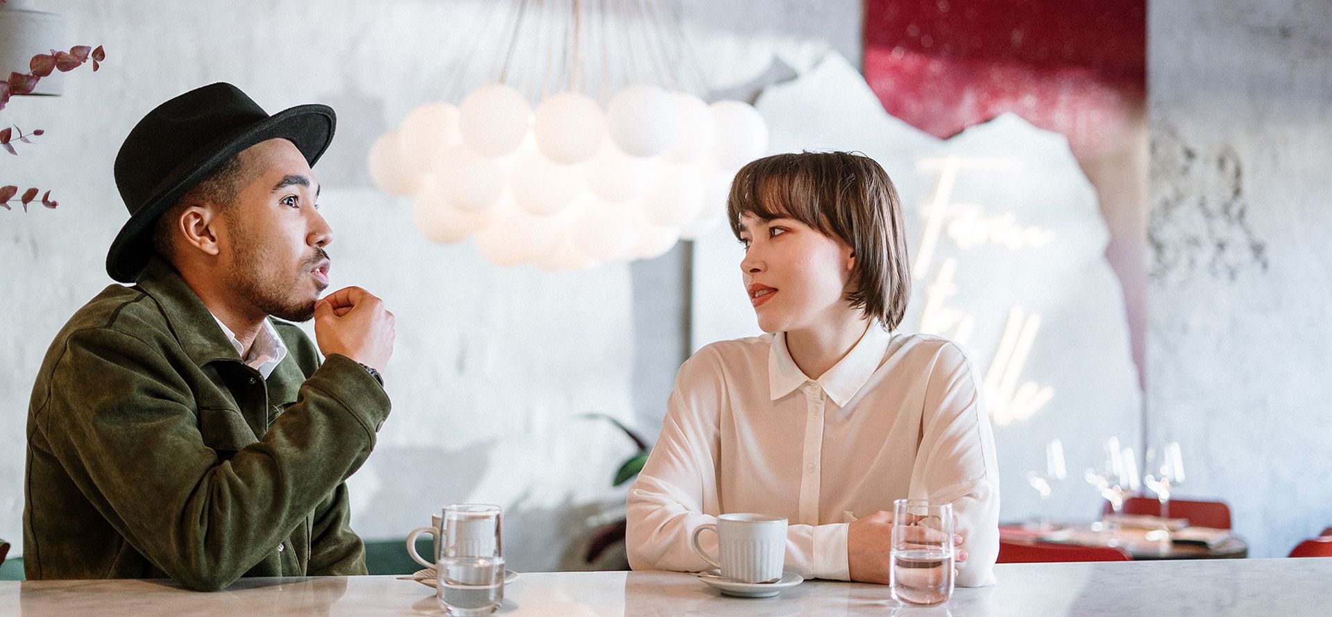 Taurus man flirting with woman in cafe.